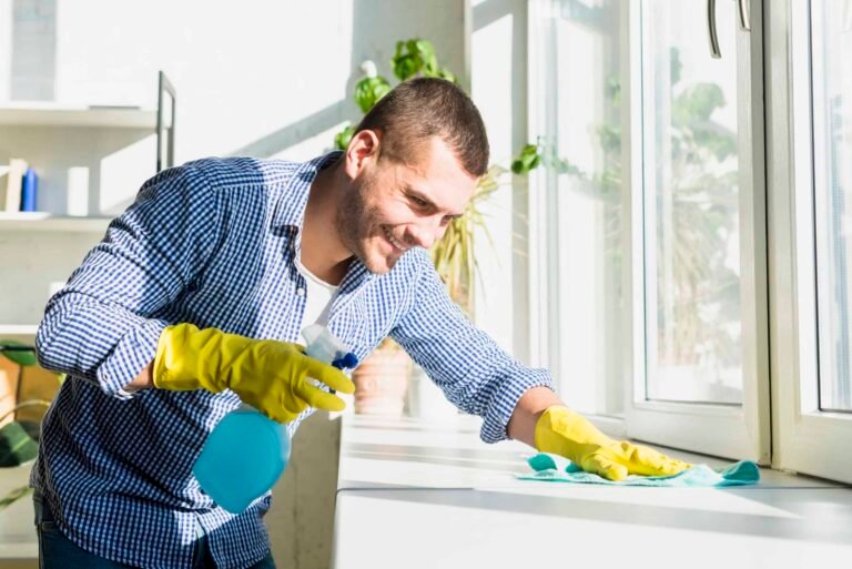 man-cleaning-his-home-scaled